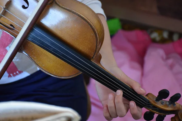 Child Playing Brown Wooden Violin Musical Instrument — стоковое фото