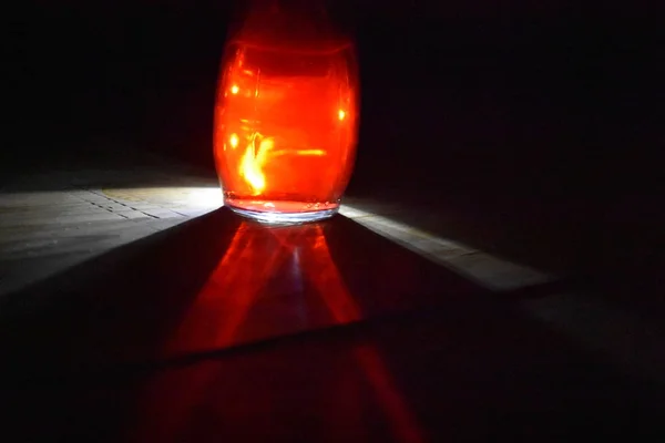 Red Glass Lantern Candle Dark Room — ストック写真