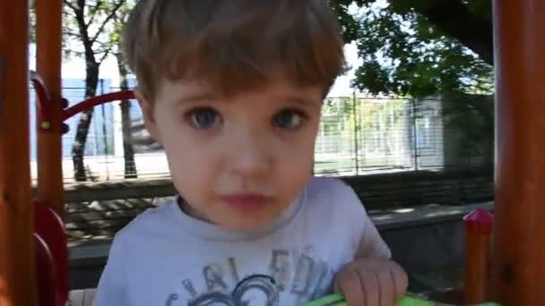 Handsome Little Boy Having Fun Playground — Vídeo de stock