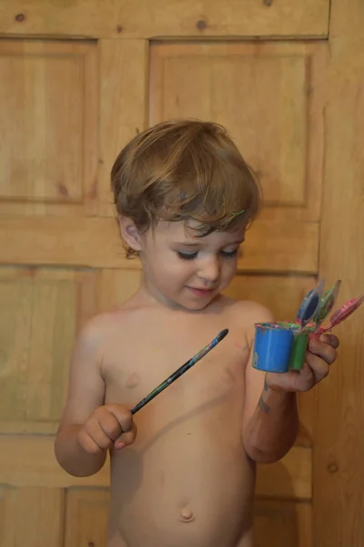 Cute Little Boy Playing Paints Brush — Stockfoto