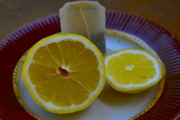 Лимон Тарелке Чайный Пакетик — стоковое фото