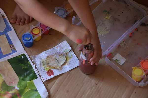 Closeup Child Placing Watercolor Brushes Jug Water — Zdjęcie stockowe