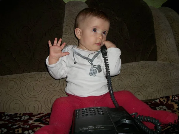 Small Boy Talking Retro Telephone Sitting Sofa — Stock fotografie