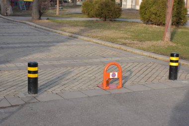 Day time shot of traffic pillars in the city