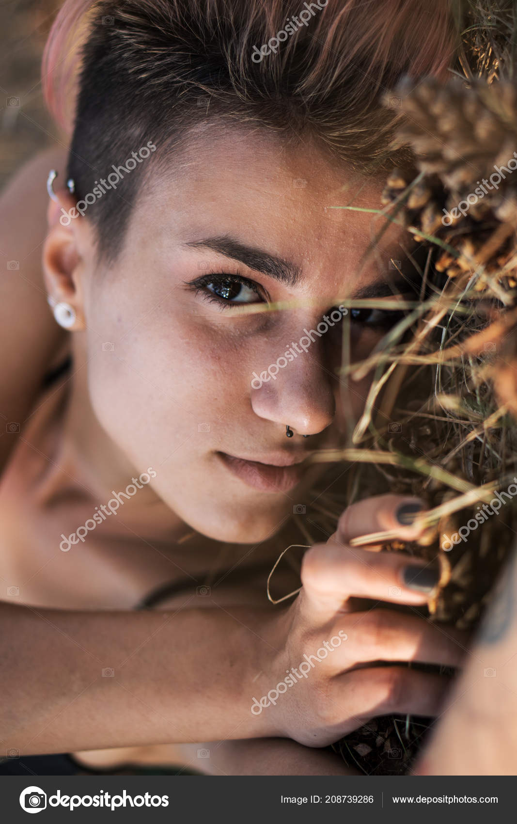 Face Of Lying On The Grass Young Punk Girl With Pink Hair And