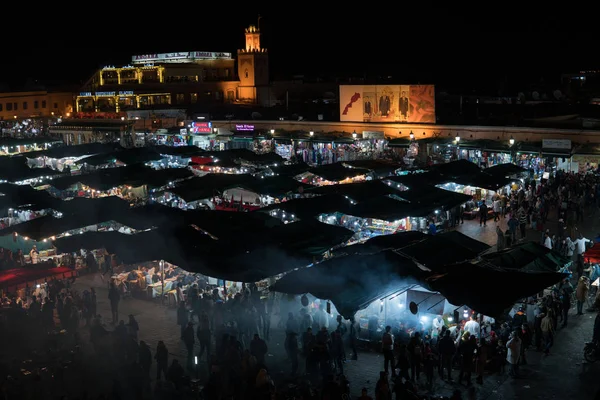 MOROCCO - MARRAKECH JAN 2019: Night view of Djemaa el Fna, a square and market place in Marrakesh medina quarter — Stock Photo, Image