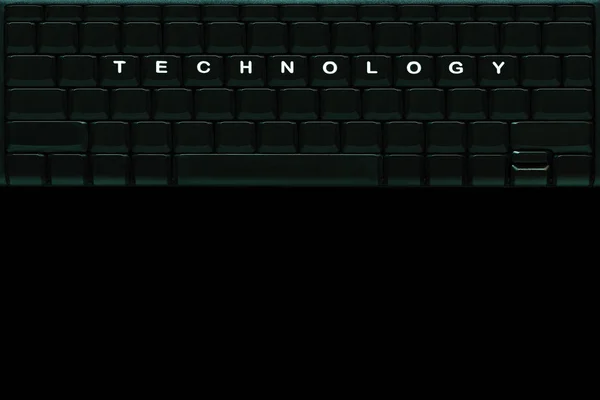 Slovo "technologie" na prázdné počítačové klávesnici. — Stock fotografie