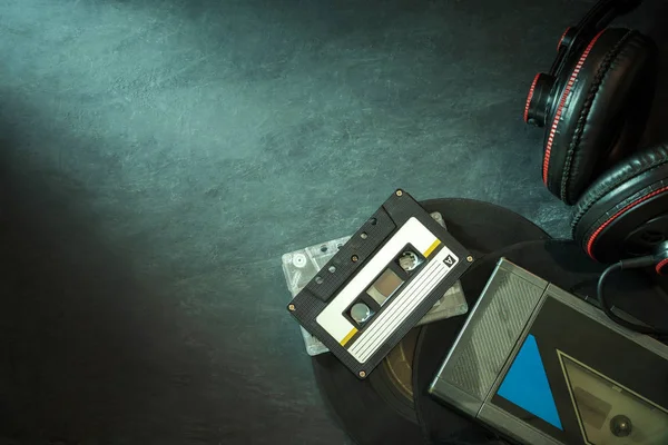 Cassette tape audio player and headphone.