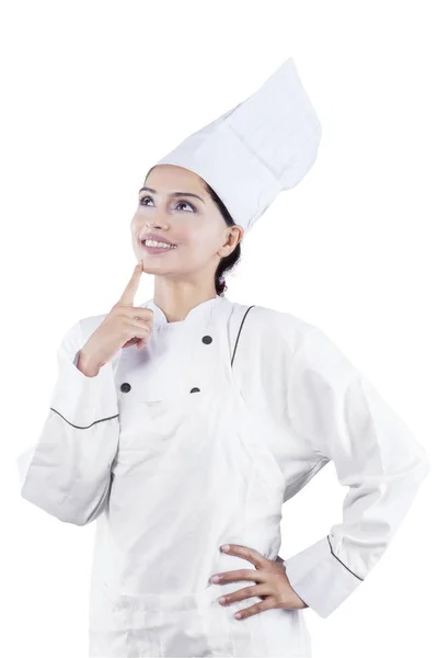 Retrato Chef Feminino Pensando Algo Enquanto Estava Estúdio Isolado Fundo — Fotografia de Stock