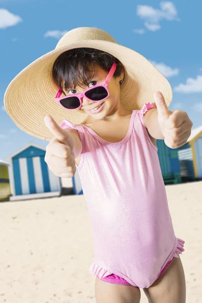 Picture Little Girl Wears Swimwear While Showing Thumbs Standing Beach — Stock Photo, Image