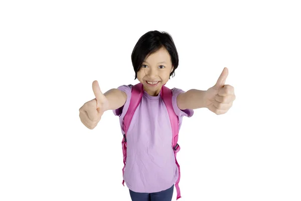Foto Van Aziatische Schoolmeisje Glimlachend Camera Terwijl Duimen Opdagen Permanent — Stockfoto