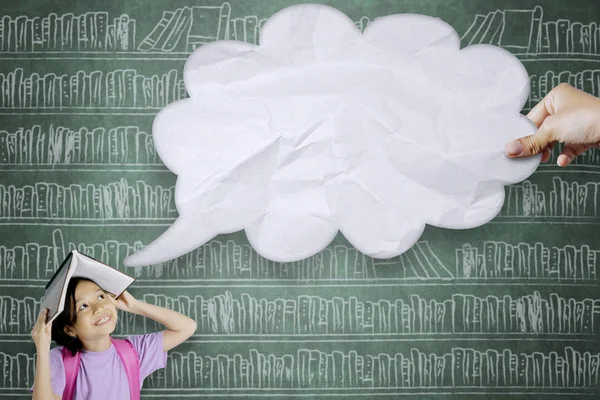 Image Pensive Schoolgirl Putting Book Her Head While Looking Empty — Stock Photo, Image