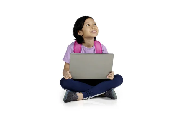Image Cute Schoolgirl Looks Pensive While Studying Laptop Sitting Studio — Stock Photo, Image