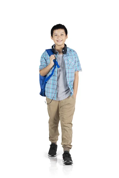 Full Length Preteen Boy Student Carrying Backpack While Walking Studio — Stock Photo, Image