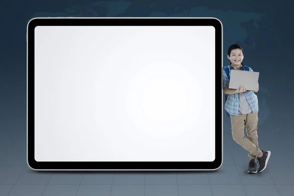 Picture Asian Preteen Schoolboy Using Laptop While Leaning Blank Whiteboard — Stock Photo, Image