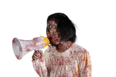 Halloween horror concept. Picture of creepy female ghost using a megaphone to speak, isolated on white background clipart