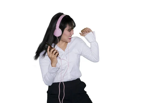 Cheerful Female Worker Listening Music Mobile Phone While Dancing Studio — Stock Photo, Image