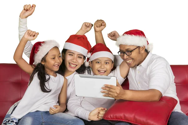 Young Family Expressing Happiness Lifting Hands While Using Tablet Together — Stock Photo, Image