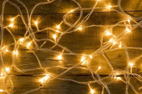 Chaotische Weihnachtsbeleuchtung Auf Vintage Holz Hintergrund — Stockfoto