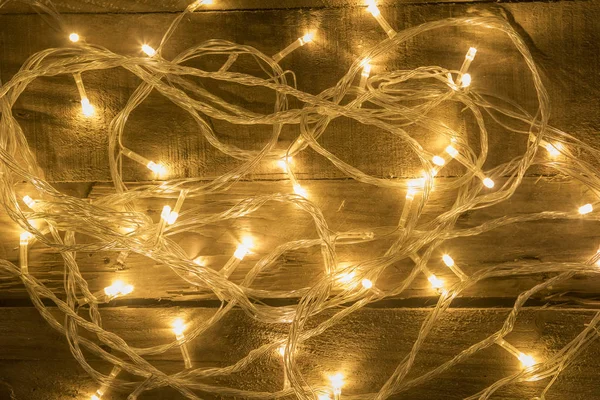 Luces Navideñas Desordenadas Sobre Fondo Madera Vintage — Foto de Stock