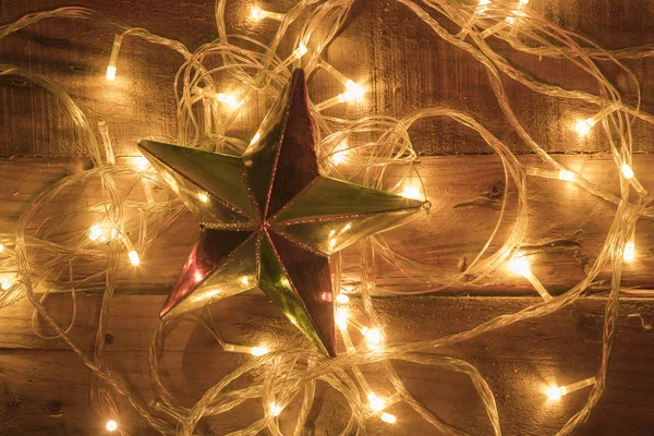 Christmas Star Ornament Shot Christmas Lights Vintage Wooden Background — Stock Photo, Image