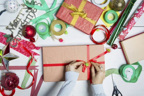 Woman Hands Decorating Christmas Gifts Wooden Table — Stock Photo, Image