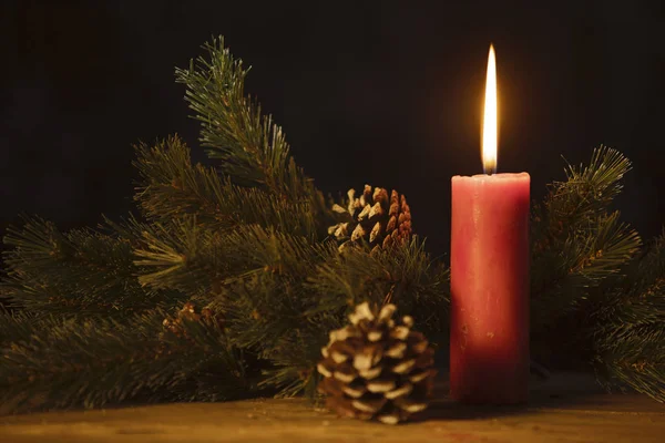 Close Red Candle Twigs Spruce Cones Dark Background — Stock Photo, Image
