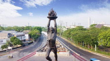 JAKARTA, Indonesia - October 10, 2018: Youth Advancement Monument is as known as Patung Pemuda Membangun at Senayan Roundabout, Jakarta, Indonesia.