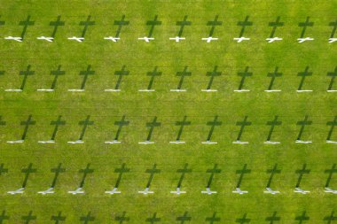 Rows of wooden crosses at Dutch war graveyard in Jakarta, Indonesia clipart