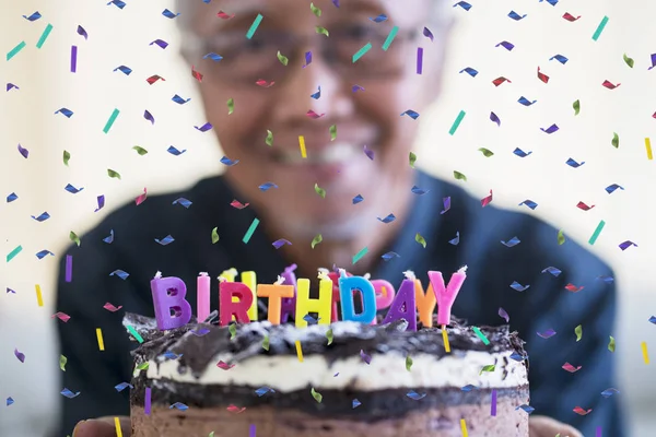 Blurred Happy Old Man Showing Birthday Cake Colorful Candles Confetti — Stock Photo, Image