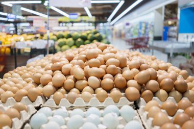 Image of chicken eggs on the package in the supermarket clipart
