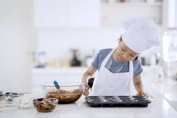 Portrait Female Little Chef Pouring Chocolate Dough Mold Make Cookie — Stock Photo, Image