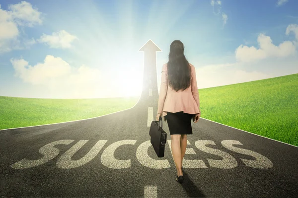 Rear View Female Entrepreneur Carrying Suitcase While Walking Success Word — Stock Photo, Image