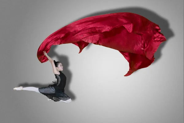 Portrait Female Ballet Dancer Holding Red Fabric While Jumping Studio — Stock Photo, Image