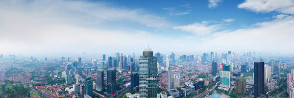 JAKARTA - Indonesia. December 12, 2018: Aerial scenery of Jakarta city with high buildings at morning time