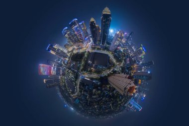 Jakarta merkezi iş bölgesine gece zaman yüksek binalar ile minyatür gezegen
