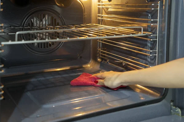Close Housemaid Hands Cleaning Microwave Using Rag Kitchen — Stock Photo, Image