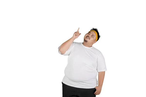배경에 운동복을 뚱뚱한 남자의 초상화 — 스톡 사진