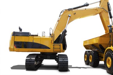 Sarı Ekskavatör toprak bir kamyon yükleme