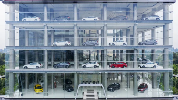 View of car showroom building with modern cars — Stock Photo, Image