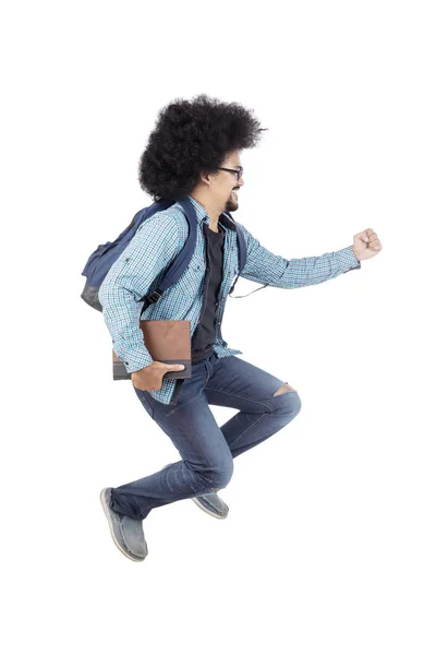 Afro college student gesturing sprints on studio — Stock Photo, Image