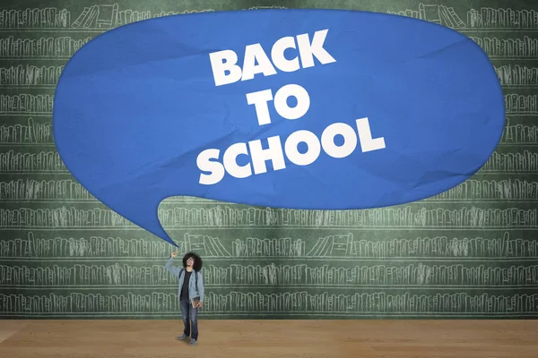 Afro student pointing text of back to school — Stock Photo, Image