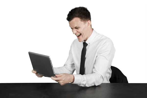 Happy caucasian businessman holds a laptop — Stock Photo, Image