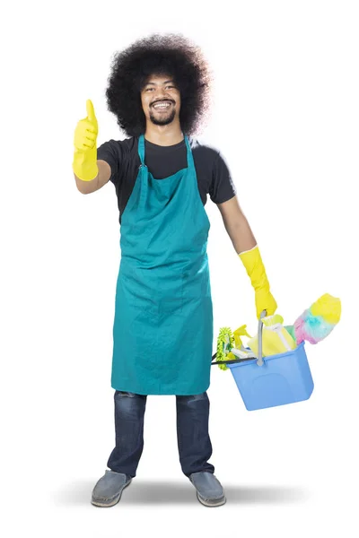 Feliz conserje masculino mostrando pulgares en el estudio — Foto de Stock