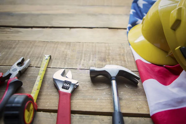 Construction tools on the table with American flag — Stock Photo, Image