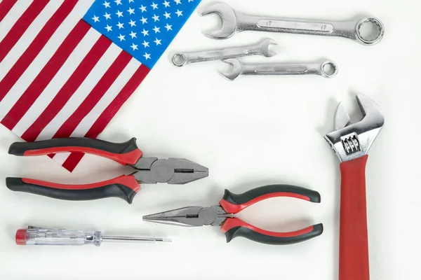 Handy tools with American flag in white background