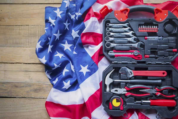 Toolbox with American flag on the wooden table — Stock Photo, Image