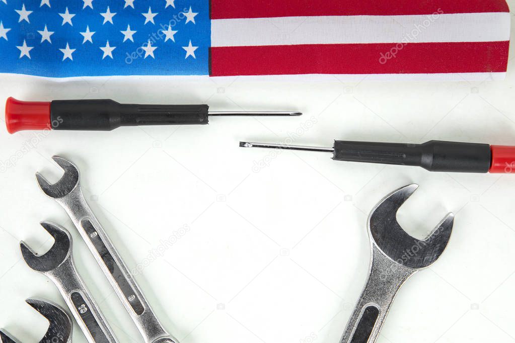 Wrenches and screwdriver with American flag