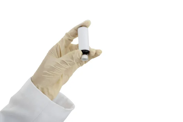 Female doctor holding a vial in the studio — Stock Photo, Image