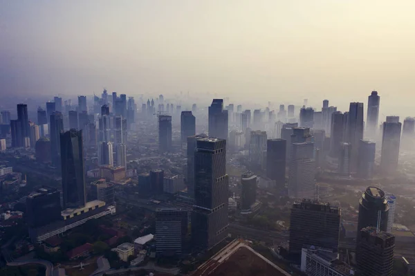 Jakarta city with air pollution at morning